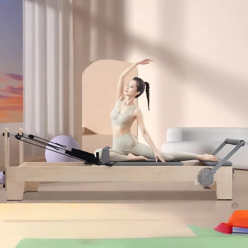 سرير بيلاتس عالي الجودة من خشب - مراجعة Yoga Fitness Pilates Reformer وسعره